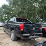 Cadillac Escalade EXT 2001-2006 in a junkyard in the USA Cadillac