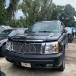 Cadillac Escalade EXT 2001-2006 in a junkyard in the USA