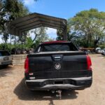 Cadillac Escalade EXT 2001-2006 in a junkyard in the USA Cadillac