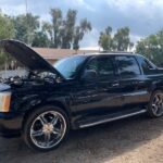 Cadillac Escalade EXT 2001-2006 in a junkyard in the USA Cadillac