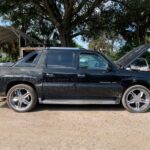 Cadillac Escalade EXT 2001-2006 in a junkyard in the USA