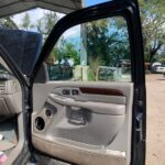 Cadillac Escalade EXT 2001-2006 in a junkyard in the USA