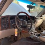 Cadillac Escalade EXT 2001-2006 in a junkyard in the USA Cadillac