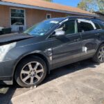 Cadillac SRX 2012-2016 in a junkyard in the USA Cadillac