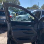 Cadillac SRX 2012-2016 in a junkyard in the USA Cadillac