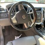 Cadillac SRX 2012-2016 in a junkyard in the USA Cadillac