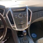 Cadillac SRX 2012-2016 in a junkyard in the USA