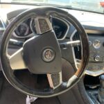 Cadillac SRX 2012-2016 in a junkyard in the USA Cadillac