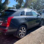 Cadillac SRX 2012-2016 in a junkyard in the USA Cadillac