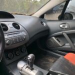 Mitsubishi Eclipse 2005-2008 in a junkyard in the USA