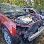 Cadillac SRX 2003-2009 in a junkyard in the USA