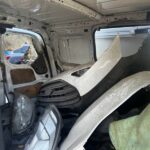 Ford Transit Connect 2014-2023 in a junkyard in the USA Ford