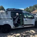 Ford Transit Connect 2014-2023 in a junkyard in the USA Ford