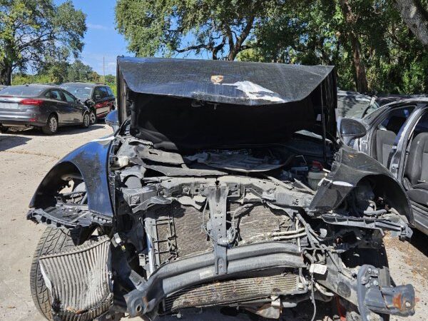 Porsche Cayenne in a junkyard in the USA Porsche