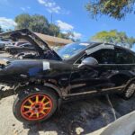 Porsche Cayenne in a junkyard in the USA Porsche