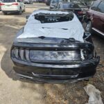 Ford Mustang 2017-2023 in a junkyard in the USA