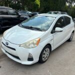 Toyota prius c 2011-2014 in a junkyard in the USA