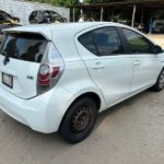 Toyota prius c 2011-2014 in a junkyard in the USA